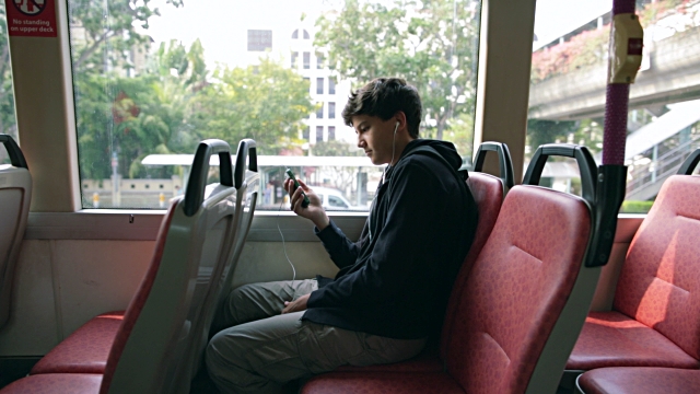 Picture of Person using avail while on a bus